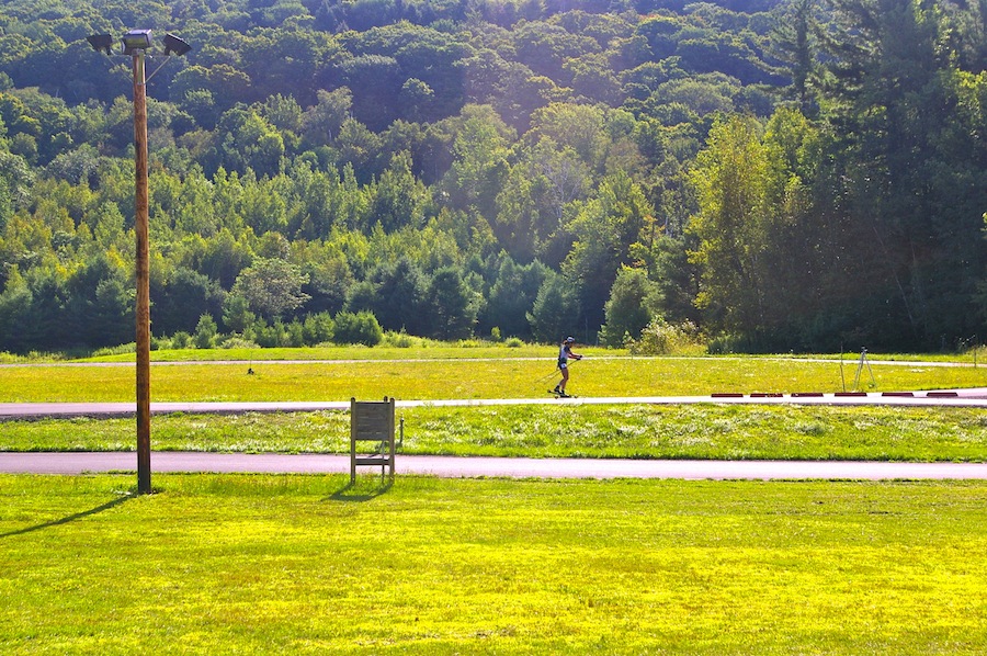 A racer heads out on the penalty loop at the Ethan Allen Firing Range in Jericho, Vt., during the 2013 North American Biathlon Rollerski Championships from Aug. 10-11.