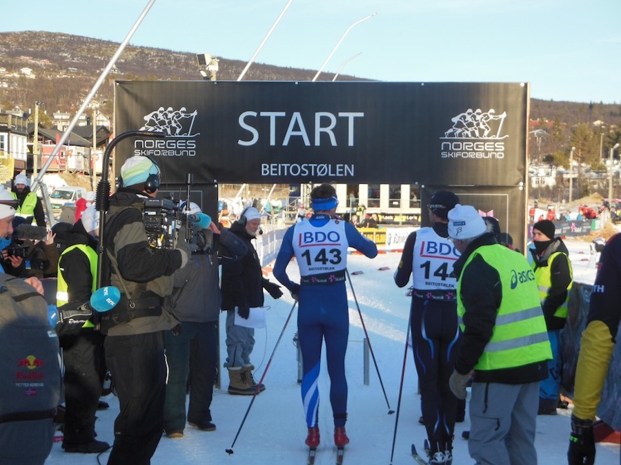 The start of the men's 15 k classic FIS race on Friday in Beitostølen, Norway, with Petter Northug (143) and U.S. Ski Team member Andy Newell to the right (142). Newell went on to place 59th, and Northug was 63rd.  (Photo: noahhoffman.com)