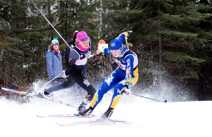Heidi Widmer (l) and Andrea Dupont after colliding at a NorAm sprint last January in Thunder Bay, Ontario. Widmer suffered a mild concussion, but qualified for the U23 World Championships as a discretionary pick and was fully recovered in five days. (Photo: John Sims)