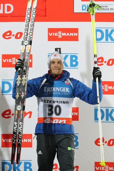 Burke on the World Cup sprint podium in Østersund, Sweden, earlier this season. (Photo: Manzoni/NordicFocus)