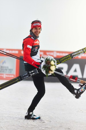 Canadian Alex Harvey celebrates his second career individual World Cup stage win on Saturday after taking first in the 4.5 k freestyle prologue on the first day of the 2013/2014 Tour de Ski. Harvey captured the leader's bib just 4 seconds ahead of teammate Devon Kershaw in second. (Photo: Fischer/Nordic Focus)