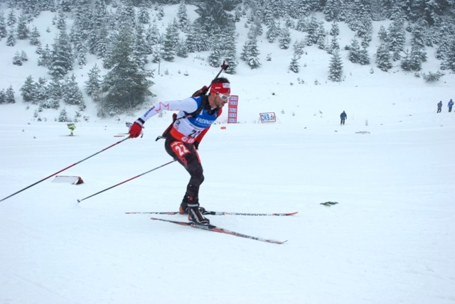 Canada's JP Le Guellec racing to 13th in Friday's 10 k sprint at the IBU World Cup in Hochfilzen, Austria.