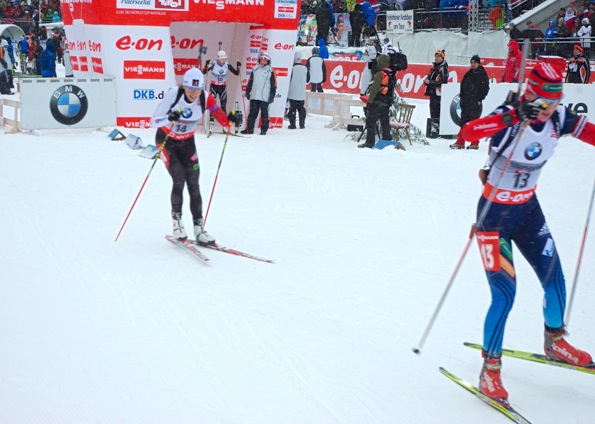 Canadian Zina Kocher chases Ekaterina Glazyrina of Russia out of the starting gate in Friday's IBU World Cup 7.5 k sprint  in Hochfilzen, Austria. Kocher ended up 25th and Glazyrina was 51st. 