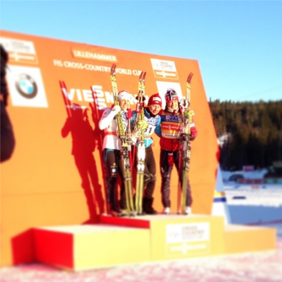 Saturday's Lillehammer World Cup 10 k classic winner, Justyna Kowalczyk of Poland (c) on the podium with Swedish runner-up Charlotte Kalla (l) and Norwegian Marit Bjørgen in third. (Photo: FIS Cross Country/Twitter)