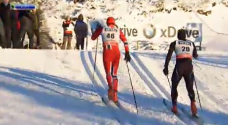 Norway's Petter Northug  (l) passing Kris Freeman (USA) around 5 k into Saturday's World Cup 15 k classic individual start in Lillehammer, Norway. Northug went on to place ninth, and Freeman was 75th. 