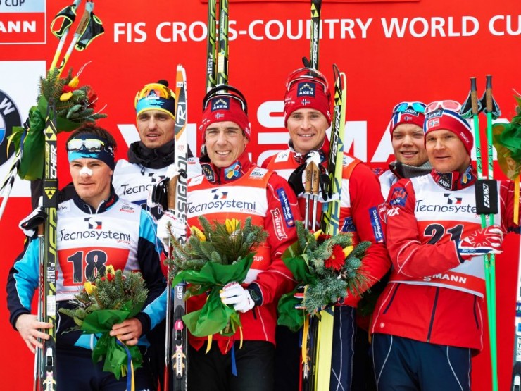 The men's classic team sprint podium at the Asiago World Cup in Italy on Sunday: Norway I won with Eldar Rønning and Ola Vigen Hattestad (c), Kazakhstan's Nikolay Chebotko and Alexey Poltoranin (l) placed second, and Norway II was third with Eirik Brandsdal and Øystein Pettersen. (Photo: Fischer/Nordic Focus)