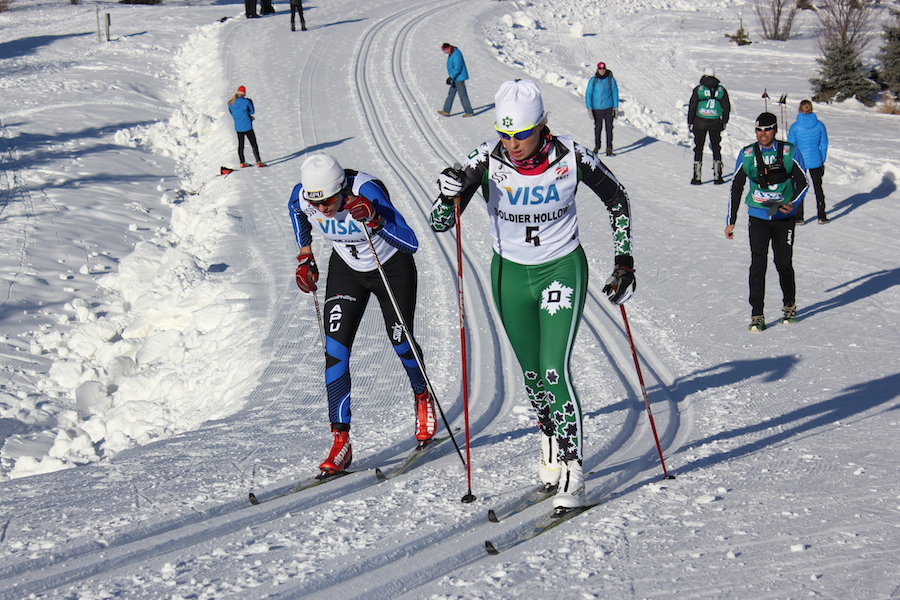 Alaska Pacific University's Becca Rorabaugh (l) takes on Dartmouth's Anne Hart (r) the first of two times up Hermod's Hill on a challenging Olympic course at 2014 U.S. Cross Country Championships. Rorabaugh won the 10 k classic individual start on Saturday in Midway, Utah, by 14 seconds.