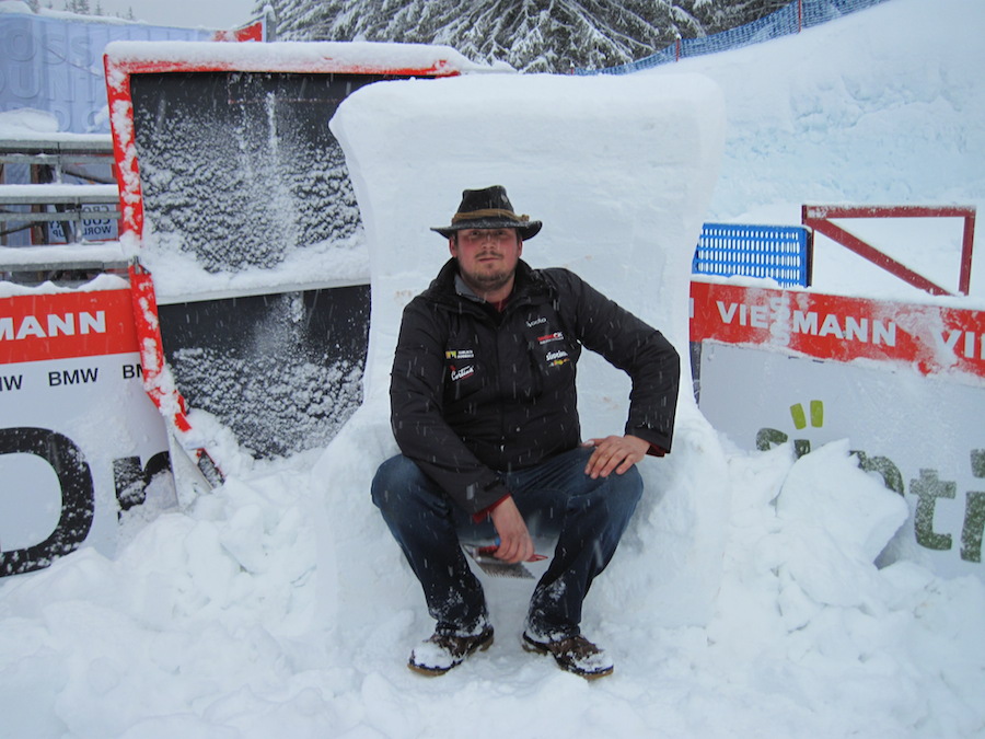 Toblach's snow carver takes as break while sitting in the leader's chair at the Toblach World Cup in Italy. (Photo: Gerry Furseth)