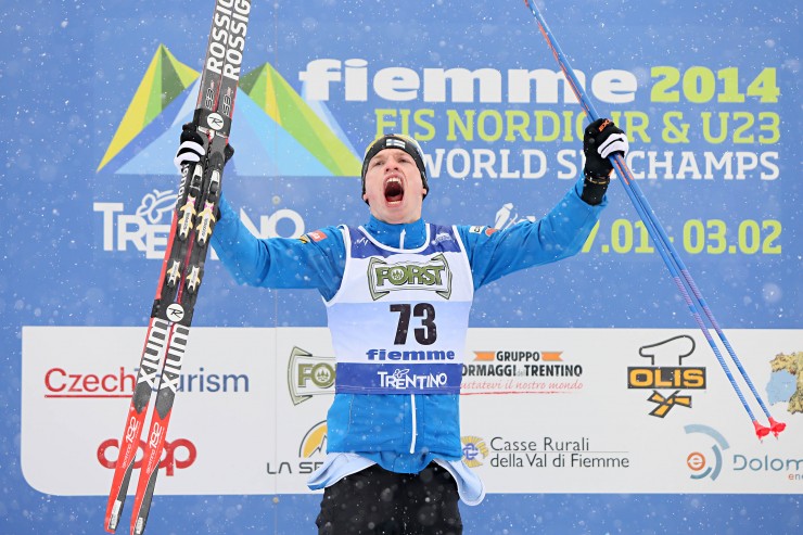 Livo Niskanen (FIN) celebrates his win in the 15 k classic at the 2014 U23 World Championships in Val di Fiemme, Italy. (Photo: Fiemme 2014)