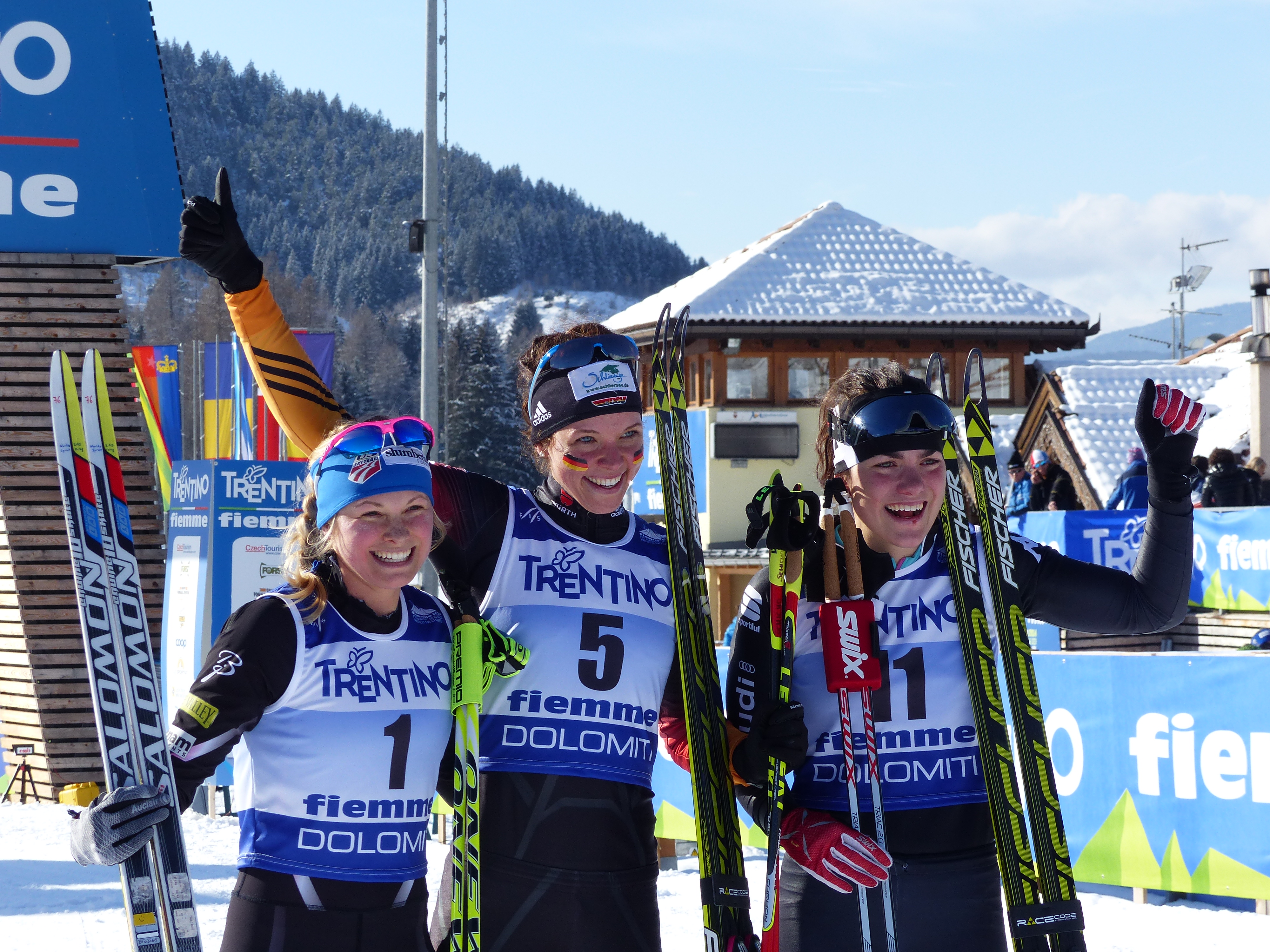 Jessie Diggins (l) was second in Wednesday's freestyle sprint at the U23 World Championships in Val di Fiemme, Italy. She was joined by Germany's Elisabeth Schicho (c) and hometown skier Giulia Stuerz (r). (Photo: Gerry Furseth) 
