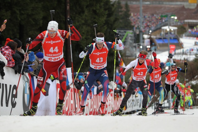 Macx Davies (bib 42) in the thick of things in the World Cup pursuit at Oberhof, Germany, in January, behind Henrik L'Abee-Lund (NOR) and Leif Nordgren (USA). Photo: USBA/NordicFocus.