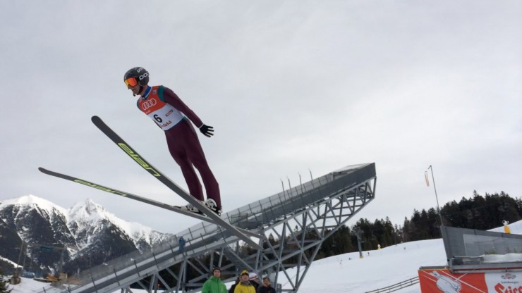 Bryan Fletcher (U.S. Nordic Combined) jumping to ninth on Day 2 of the Nordic Combined World Cup Triple in Seefeld, Austria. Fletcher improved to sixth in the 10 k. (Photo: Fast Big Dog)
