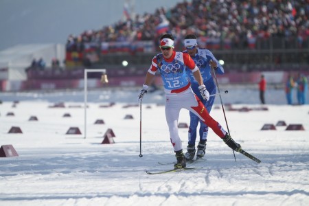 Canada's Jesse Cockney leads Estonia's Karel Tammjarv on the final leg of the relay.