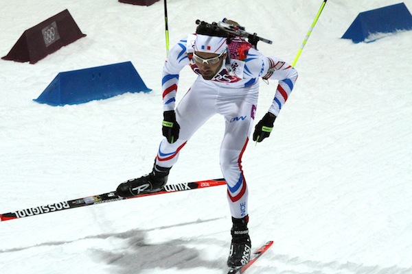 Martin Fourcade of France races to the first Olympic gold medal of his career on Monday in the men's 12.5 k pursuit at the 2014 Winter Games in Sochi, Russia.