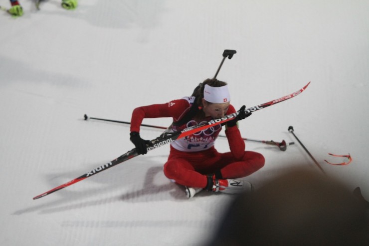Selina Gasparin kisses her skis, which helped her to the 10th-best course time of the day and a silver medal.