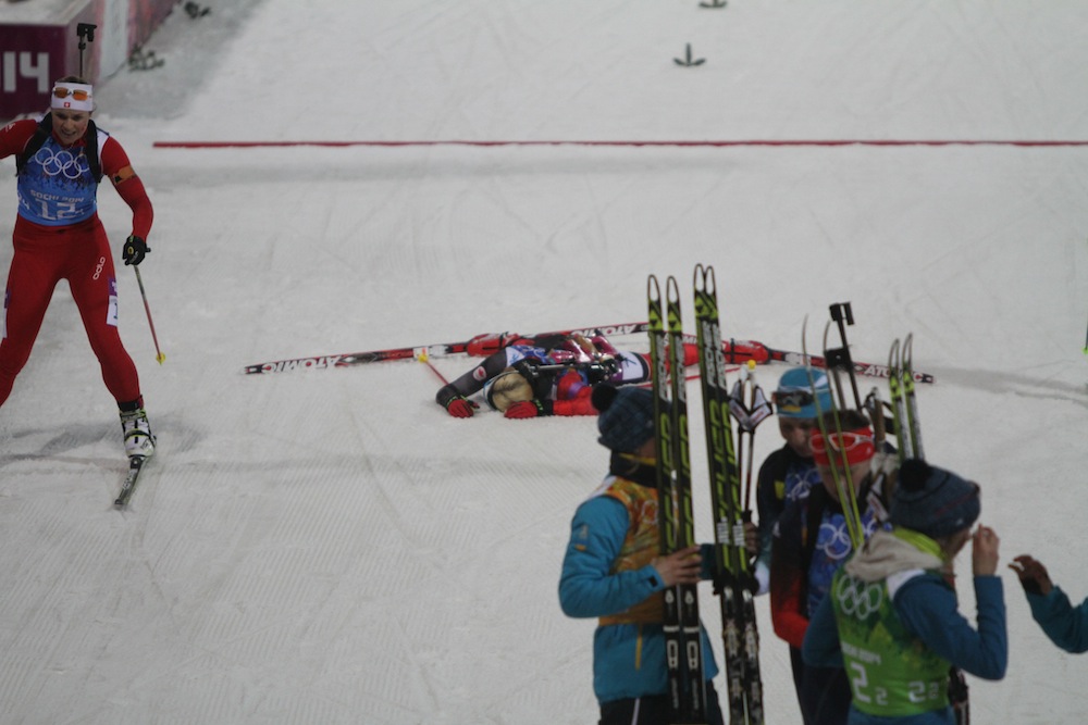 Zina Kocher collapsed at the finish line of the women's 4 x 6 k relay after giving on of the best ski performances of any athlete all day. Unfortunately, she was not able to match that on the range.