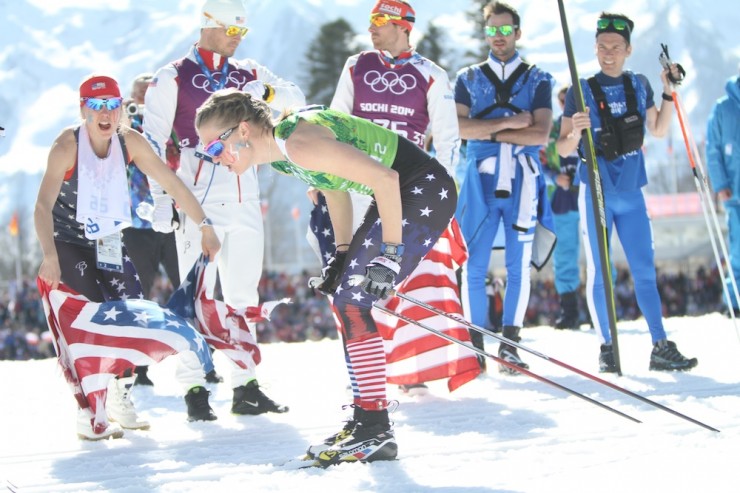 Members of the U.S. Ski Team cheer on their own Sadie Bjornsen in the second leg of Friday's Olympic 4 x 5 k relay in Sochi, Russia. The team ultimately placed ninth for their best result since 1998.