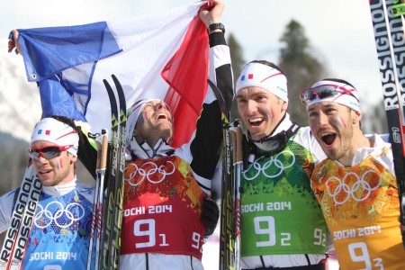 The french relay skiers celebrate their bronze medal in the men's relay.