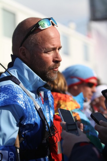 Trond Nystad, the coach of the Norwegian men's cross-country ski team, takes questions from the media after Sunday's relay.