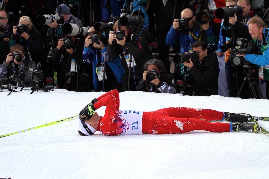 The 2014 Olympic men's skiathlon champion, Dario Cologna of Switzerland absorbs the fruits of his efforts and three months of recovering from an ankle injury that kept him from competing for the first half of the season.