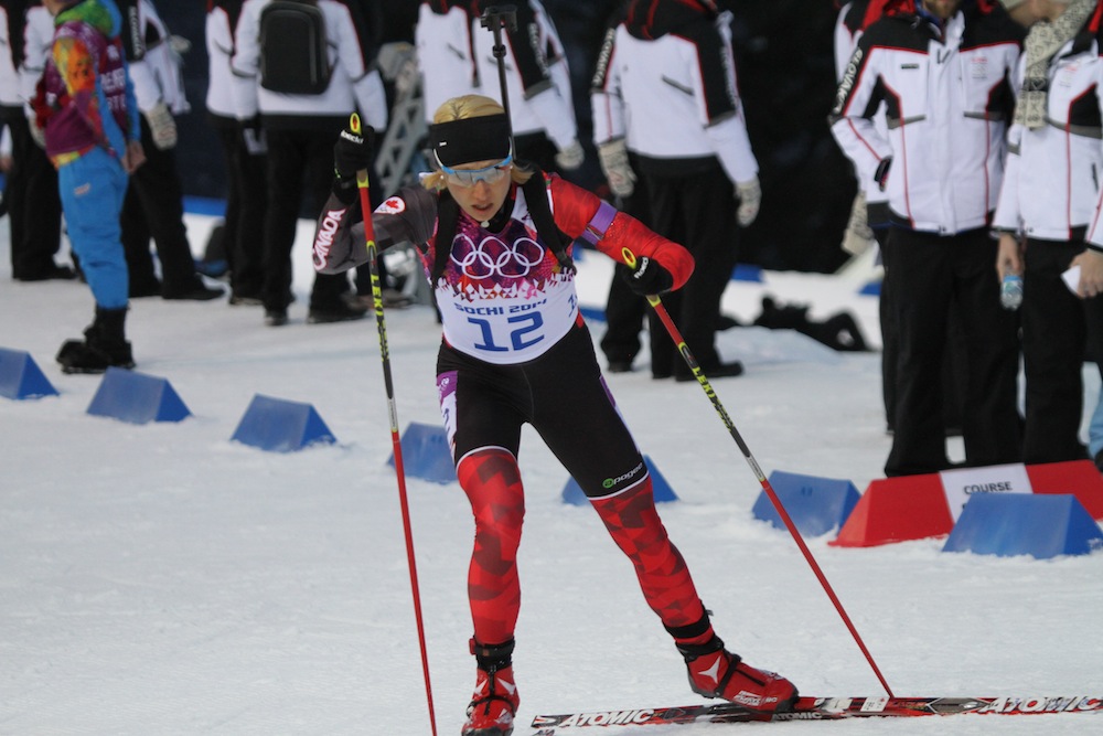 Canada's Zina Kocher racing to 32nd in Sunday's Olympic 7.5 k sprint, the first women's biathlon race of the 2014 Winter Games in Sochi, Russia.