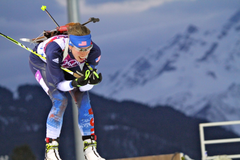 Susan Dunklee racing to 14th place in the women's 7.5 kilometer sprint race Saturday at the Sochi Olympics.