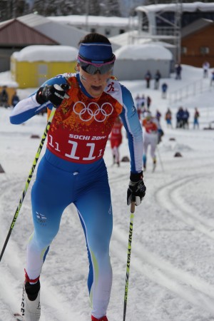 Aino-Kaisa Saarinen competing in the Olympic team sprint, where she won silver. Photo: Holly Brooks.