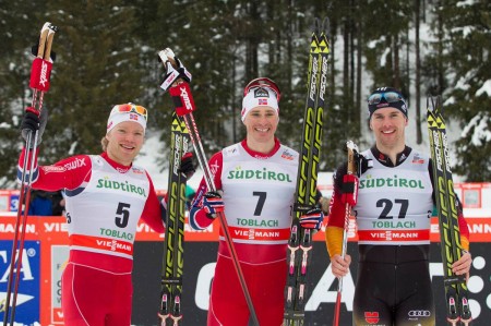 Eirik Brandsdal (NOR), Ola Vigen Hattestad (NOR) and Josef Wenzl (GER) claim the podium in Toblach.  Photo: Fischer / Nordic Focus.