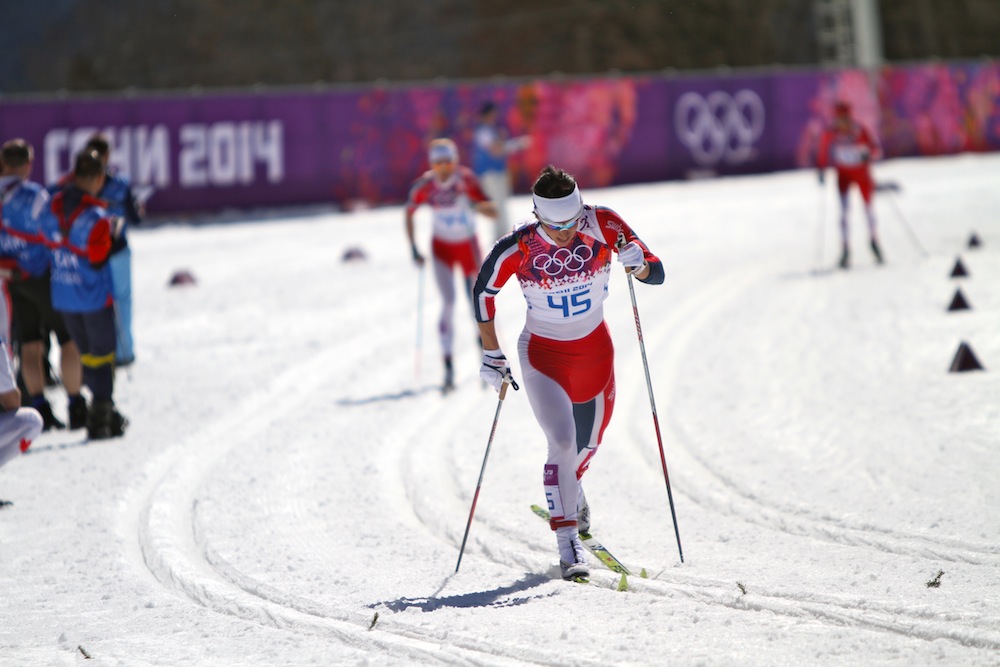 Norway's Marit Bjørgen suffering in Thursday's 10 k classic individual start at the 2014 Olympics in Sochi, Russia. She placed fourth behind winner Justyna Kowalczyk, Sweden's Charlotte Kalla in second, and her Norwegian teammate Therese Johaug in third.