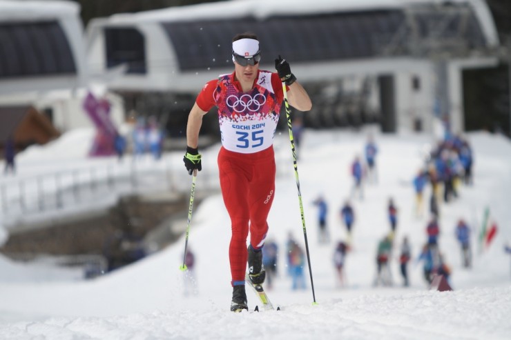 Dario Cologna racing to his second gold of the 2014 Olympics in Friday's 15 k classic individual start. 