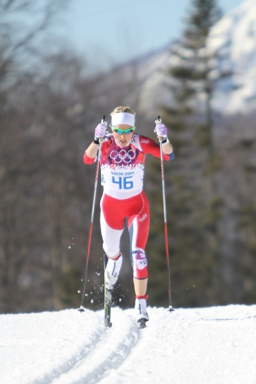 Norway's Therese Johaug pushes for bronze in the women's 10 k classic individual start on Thursday at the 2014 Olympics in Sochi, Russia.