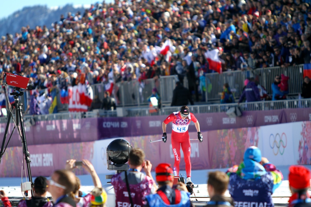 Poland's Justyna Kowalczyk pushes for the fastest time by 18 seconds in the women's 10 k classic individual start at the Olympics, which held for gold, on Thursday in Sochi, Russia. 