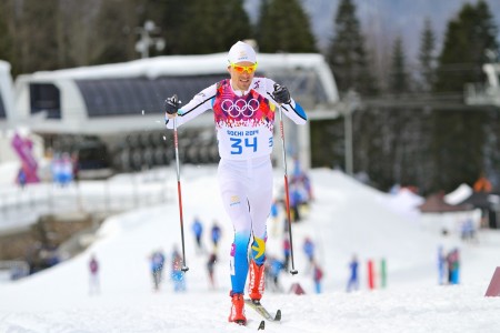 Sweden's Johan Olsson racing to second place in the 15 k at the Olympics in Sochi.