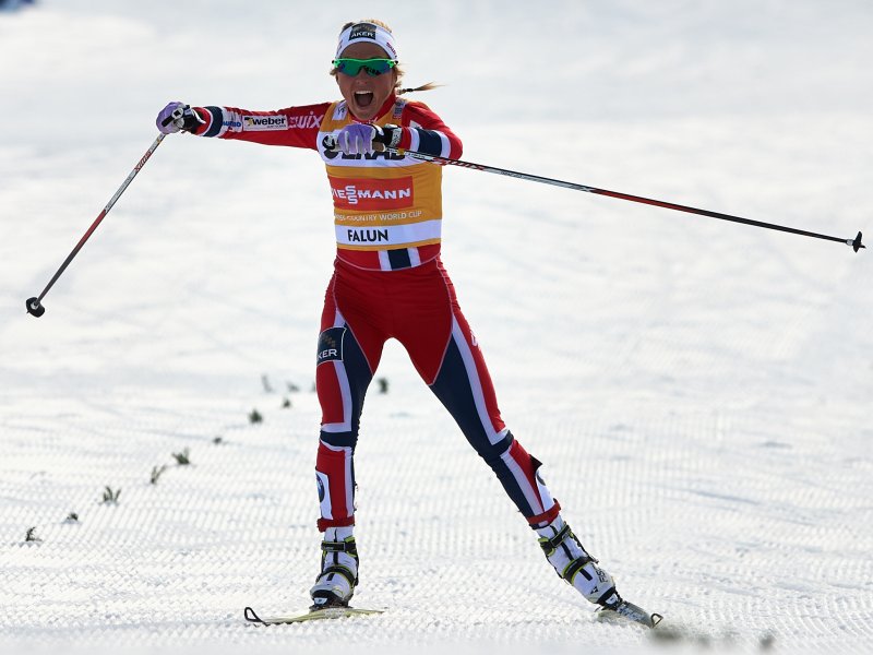 Norway's Therese Johaug celebrates a nearly 30-second victory in the 10 k freestyle pursuit over teammate Marit Bjørgen on Sunday at World Cup Finals in Falun, Sweden, which sealed Johaug's first overall World Cup title. (Photo: Fischer/Nordic Focus)