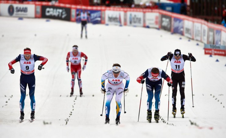 American Andy Newell (11) racing for a spot in Friday's classic-sprint final against Russia's Nikita Kriukov (l), Sweden's Teodor Peterson (in white), and Sergey Ustiugov (second from r) at World Cup Finals in Falun, Sweden. Newell placed fourth and did not advance for eighth overall. (Photo: Fischer/Nordic Focus)