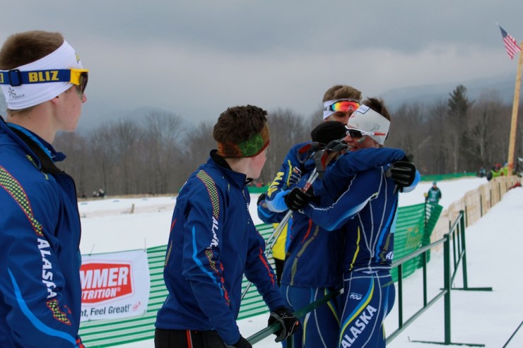 Team Alaska congratulates Thomas O'Harra (r) for anchoring them to a U18 3 x 3 k freestyle relay title at Junior Nationals in Stowe, Vt.