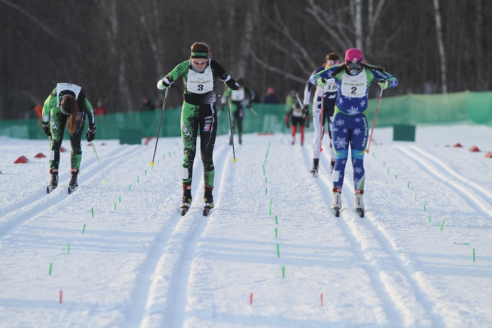 Julia Kern (r) racing to a classic-sprint title at Junior Nationals on Wednesday in Stowe, Vt., edging Mattie Watts (c) and Vivian Hett, both from the Midwest.