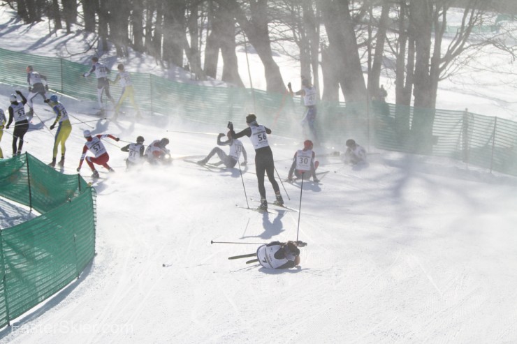 A massive pileup on the first corner shortly after the start of the U20 men's 15 k freestyle mass start on Friday at 2014 Junior Nationals in Stowe, Vt.