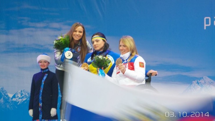 Upham coached Oksana Masters (second from l) two two Olympic medals this February. She became the most successful female nordic skier in U.S. Paralympic history. (Photo U.S. Paralympics Nordic)
