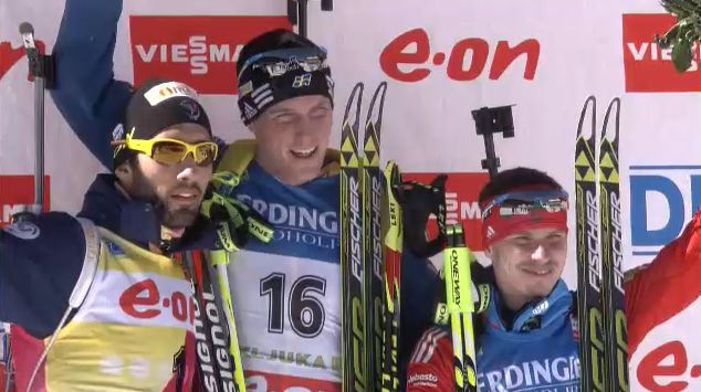 Bjorn Ferry of Sweden (center) won today's 15 k mass start over Martin Fourcade of France (left) and Evgeny Ustyugov of Russia (right).