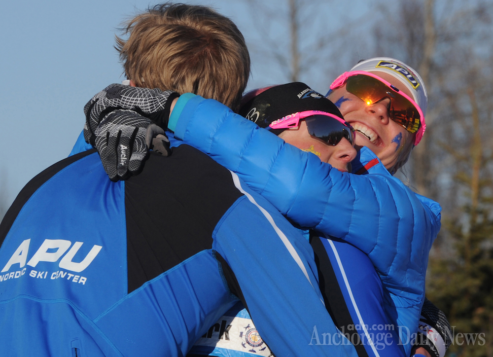 APU's first team congratulates anchor Kikkan Randall after she solidified their national title in the 4 x 5 k mixed relay on Tuesday. It was Randall's third-straight win in as many races this week in Anchorage, Alaska. (Photo: Bill Roth/Anchorage Daily News) 