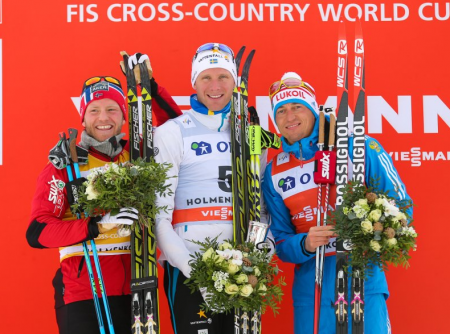 The podium at the 2014 Holemnkollen 50 k. Martin Johnsrud Sundby, Daniel Richardsson, Alexander Legkov (l-r) Photo: Fischer/Nordic Focus