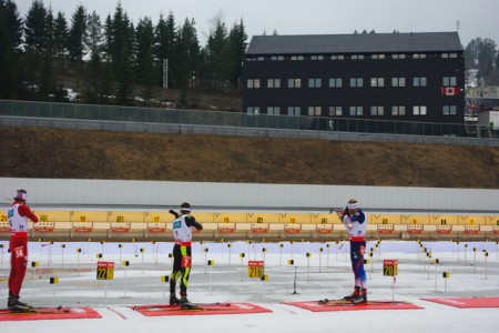 Lowell Bailey (right) shooting during today's 12.5 k World Cup pursuit.