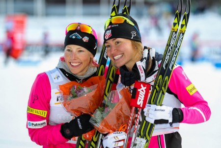 Fellow U.S. Ski Team members Kikkan Randall (l) and Sophie Caldwell after finishing an unprecedented first and third, respectively, in the Lahti World Cup freestyle sprint on Saturday in Finland. (Photo: Fischer/Nordic Focus)