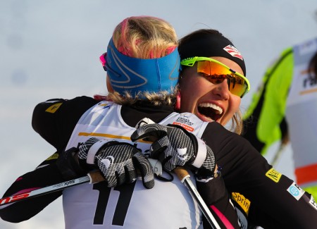 U.S. teammate Kikkan Randall (l) and Sophie Caldwell celebrate the first U.S. double podium in Saturday's World Cup skate sprint in Lahti, Finland. (Photo: Fischer/Nordic Focus)