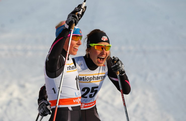 U.S. teammate Kikkan Randall (l) and Sophie Caldwell celebrate the first U.S. double podium in Saturday's World Cup skate sprint in Lahti, Finland. (Photo: Fischer/Nordic Focus)