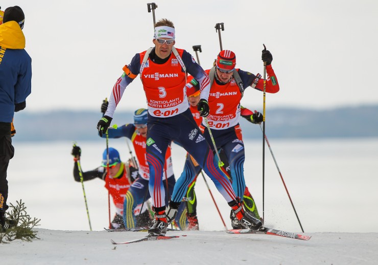 Lowell Bailey (USA) leading Alexander Loginov of Russia in last season's World Cup pursuit in Kontiolahti, Finland. In the sprint, Loginov had placed second and Bailey third; a previous sample of Loginov's has tested positive for EPO. Photo: USBA/NordicFocus.