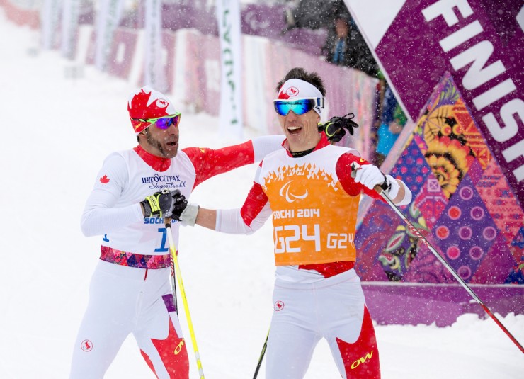 Canada's Brian McKeever (l) and his guide Graham Nishikawa win the gold medal in the Men's 1 k visually impaired sprint final at the 2014 Paralympic Winter Games in Sochi, Russia. (Photo: Matthew Murnaghan/Canadian Paralympic Committee)