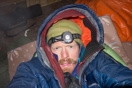 I take a selfie as I prepare to go to sleep in the bear-trashed cabin in Chisana. Photo: Seth Adams