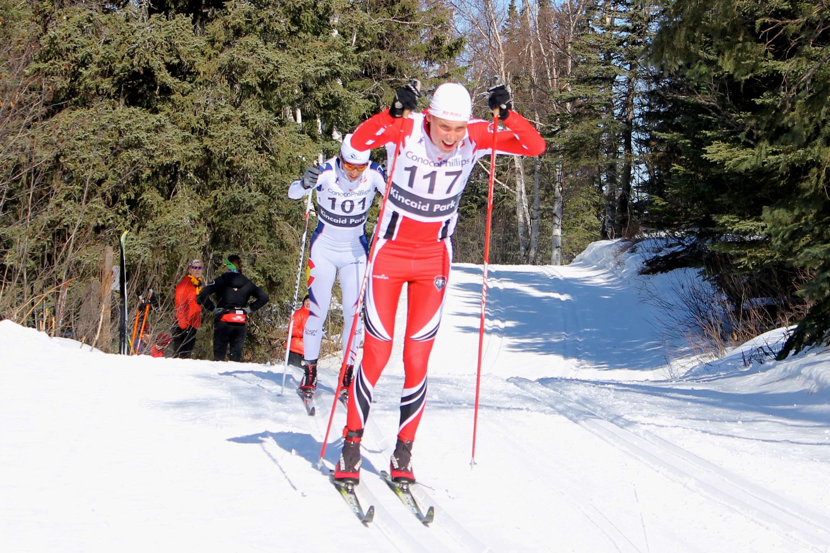 Aku Nikander (117) leads Noah Hoffman of the U.S. Ski Team with about 4 k to go in the 50 k classic mass start at U.S. Distance Nationals on March 28. Nikander went on to out-double pole Hoffman for the win.